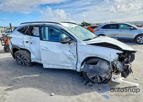 2022 Hyundai Tucson Blue z USA, uszkodzony, nr VIN KM8JBCA18NU075970